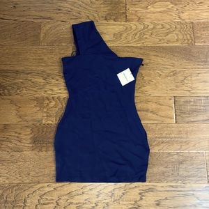New dress with tags! Navy blue and super cute—it has a smaller ripped seam shown